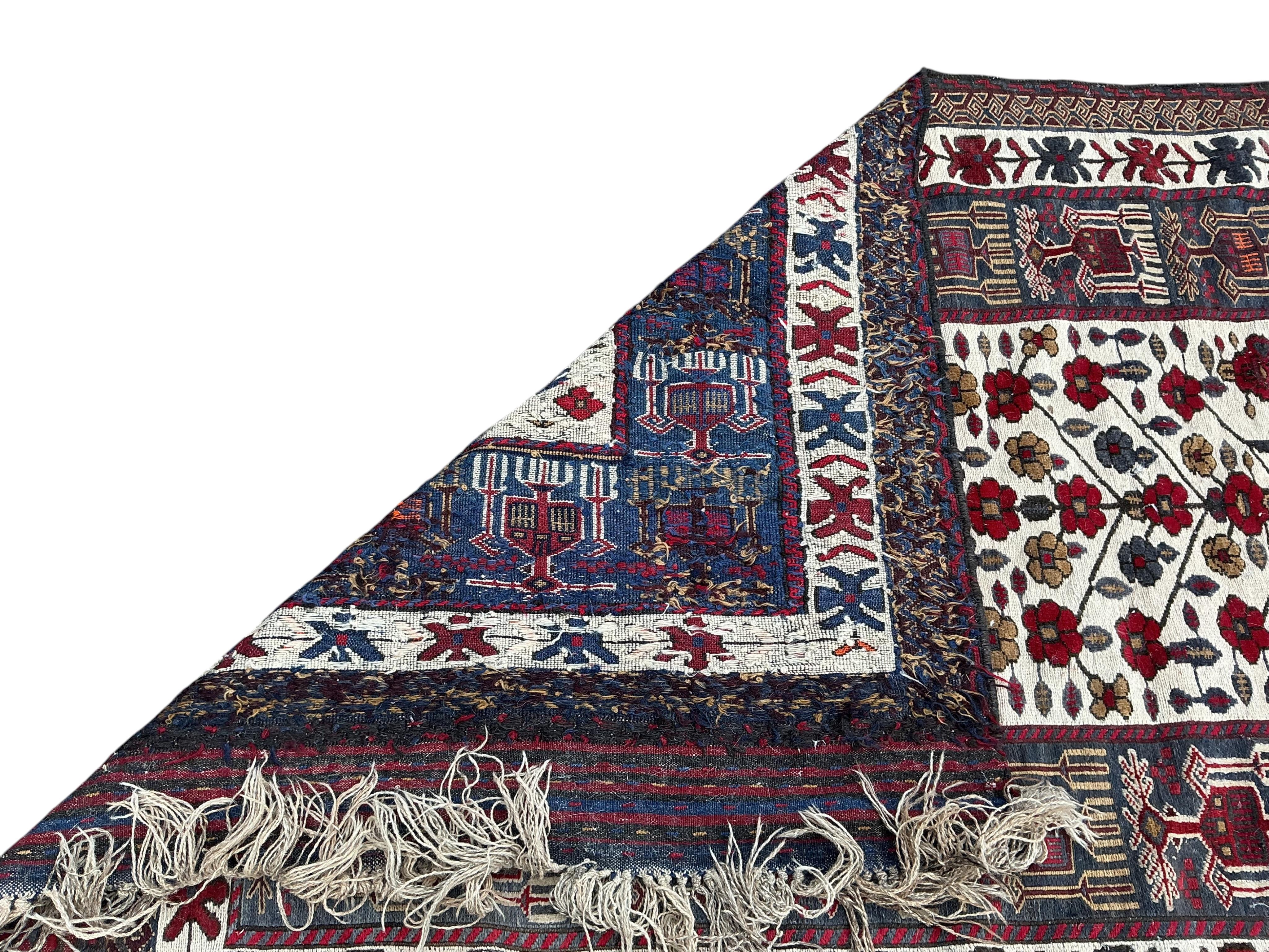 A Turkish polychrome flatweave carpet, approx. 220 x 140cm